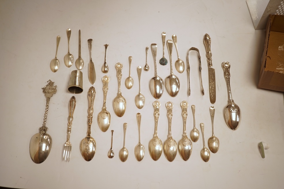 A small quantity of assorted mainly 19th century and later small flatware including teaspoons, coffee spoons and condiment spoons, various dates and makers, a Dutch? white metal spoon and a Victorian silver christening t